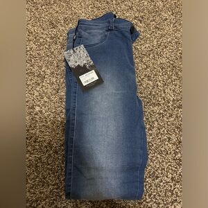 Brand new FIT skinny jeans with tags still on. Could not return.